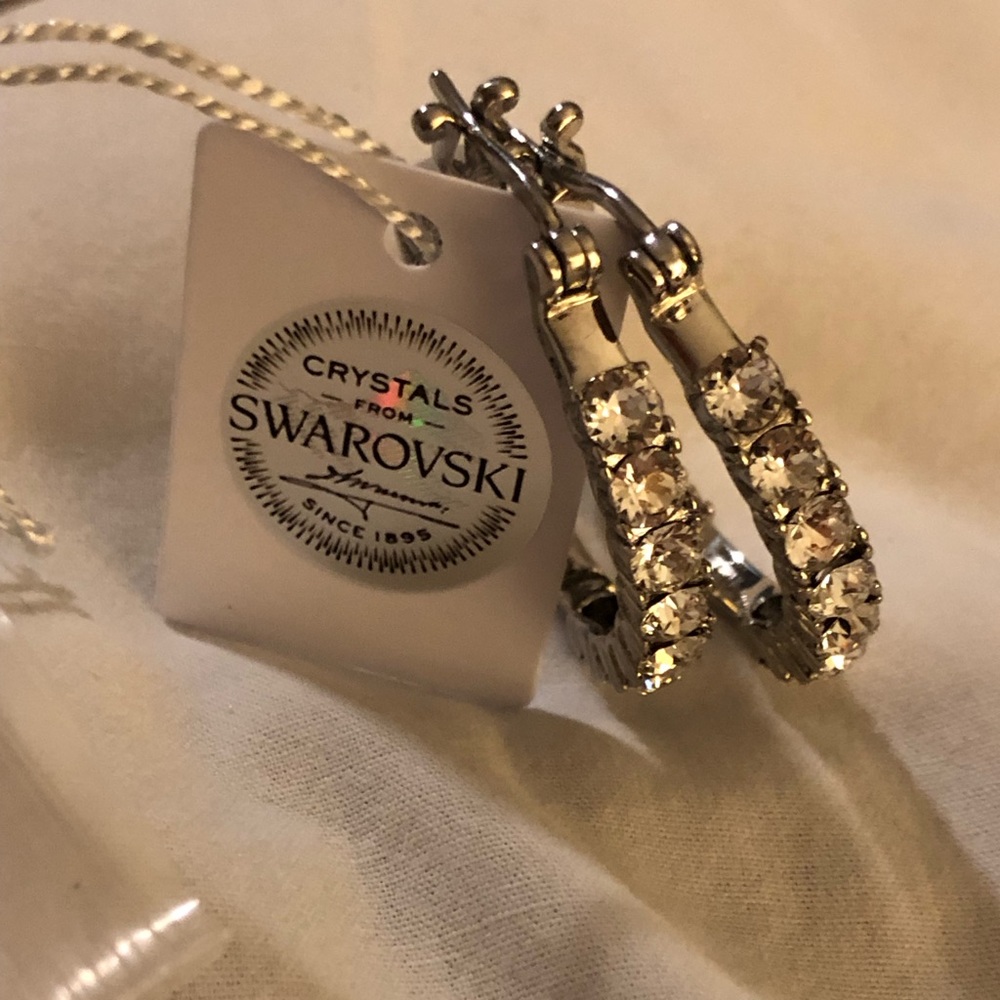 Swarovski amazingly stunning crystal white hoop earrings.
